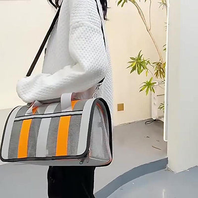 sac-transport-pour-chat-ultra-ventile-orange-femme